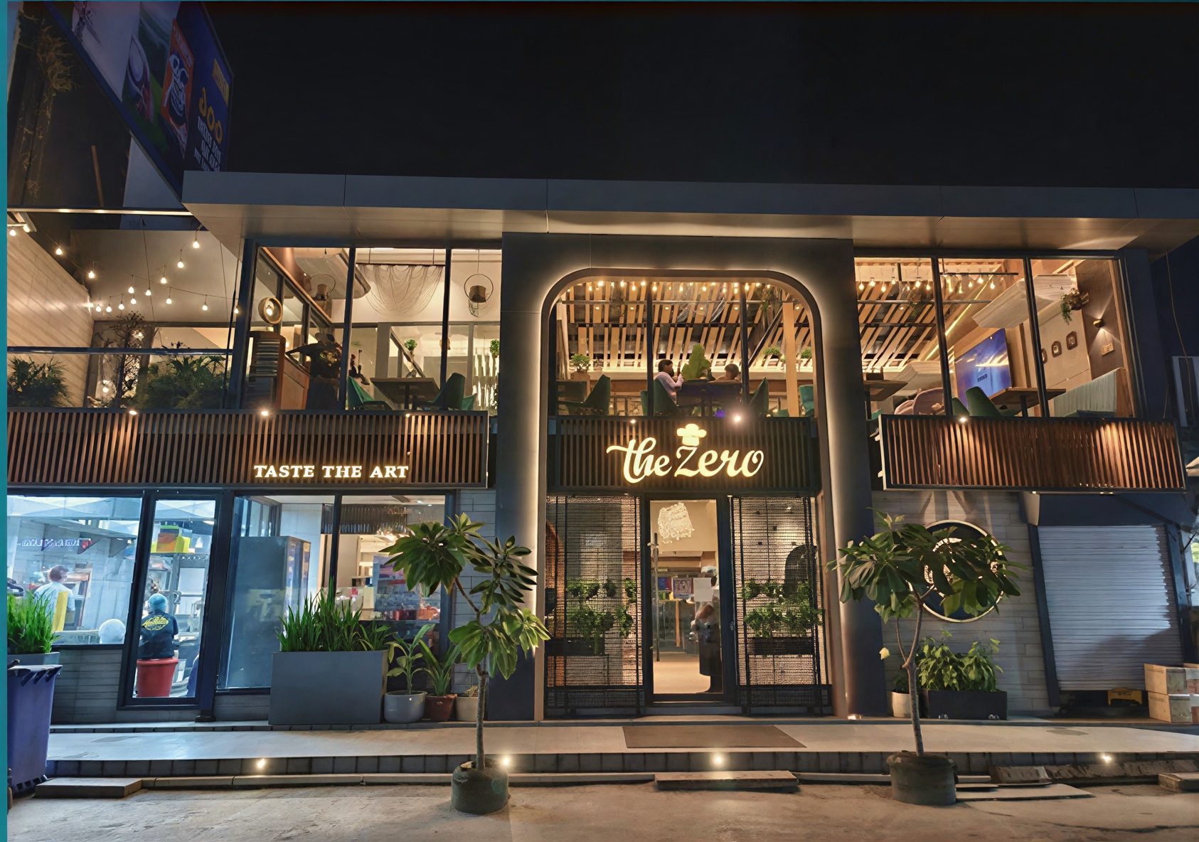 The Zero storefront in Dhaka, lit up at night